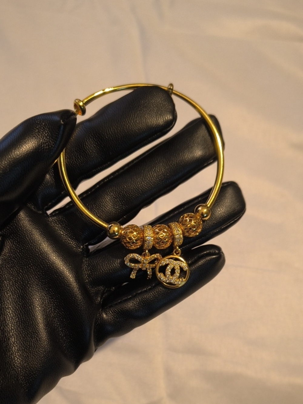 Adjustable Gold Bracelet With Charms